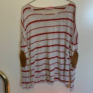 long sleeve red and white shirt with elbow pads